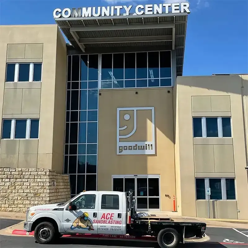 Ace Sandblasting truck outside a Goodwill community center