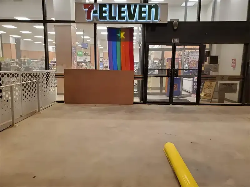 7-Eleven entrance and yellow bollards after concrete sandblasting