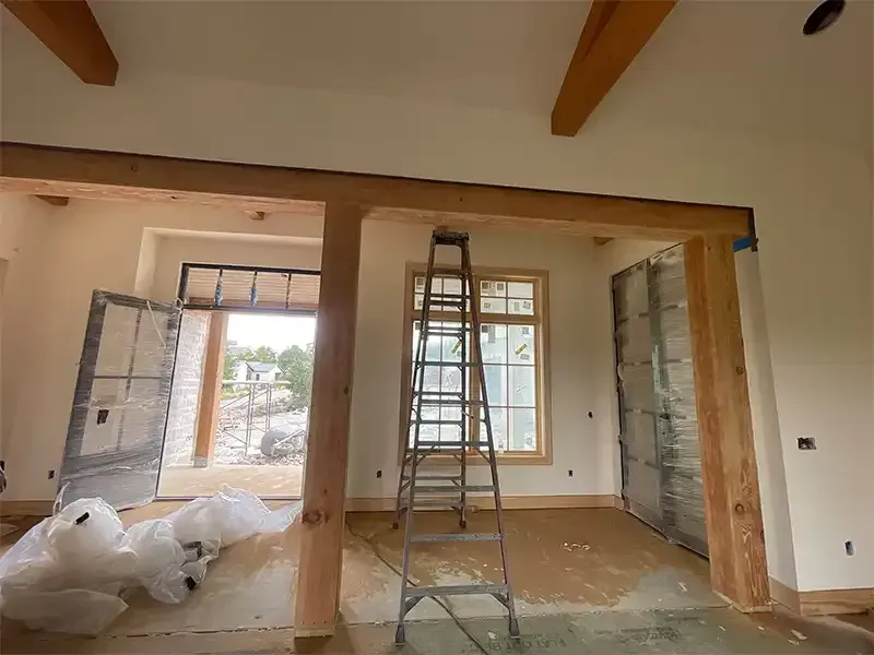 Interior timber beams and trim cleaned by sandblasting in a new home