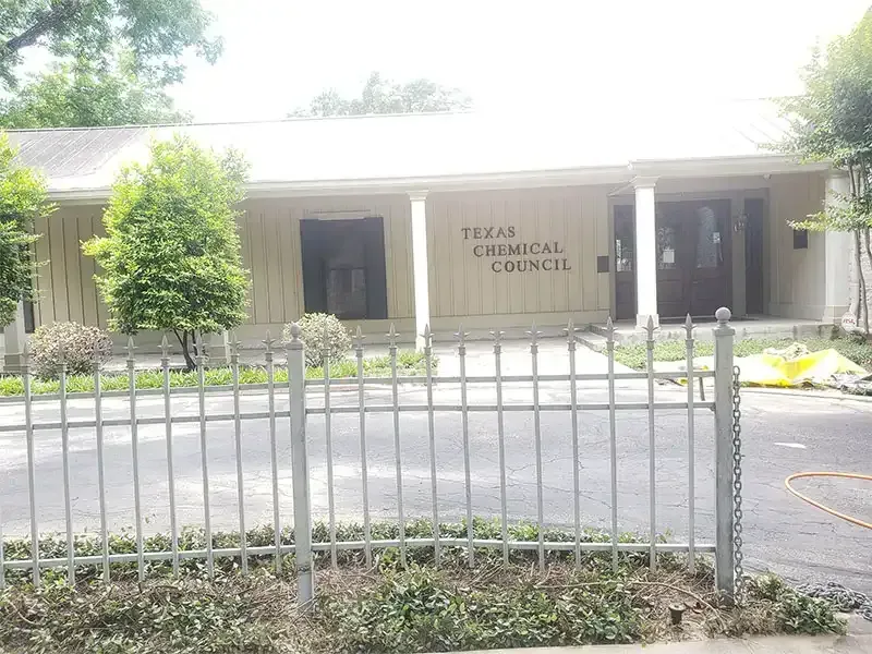 Iron fence at the Texas Chemical Council office after sandblasting